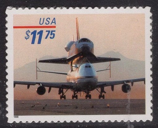 PIGGYBACK SPACE SHUTTLE Landing Astronauts Program - Bright Fresh Stamp - Quantity Available - Issued in 1998 s3262 -